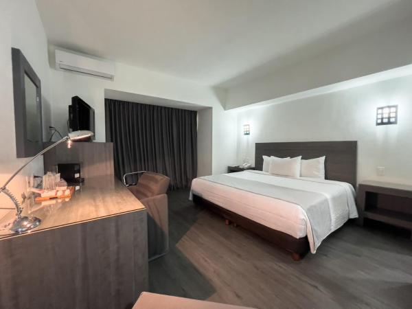 We Hotel Aeropuerto : photo 2 de la chambre chambre lit king-size - vue interne