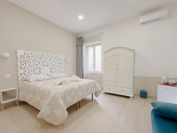 Real poggio : photo 10 de la chambre chambre double deluxe