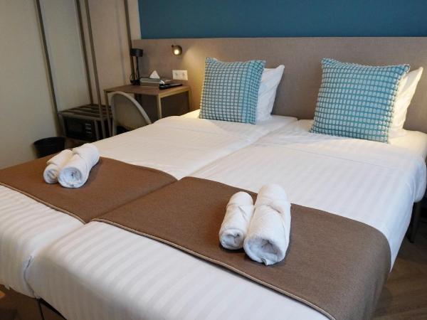 Hotel Fogo Amsterdam : photo 2 de la chambre chambre lits jumeaux spacieuse
