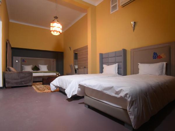 Kasbah de Tifoultoute : photo 7 de la chambre chambre familiale supérieure