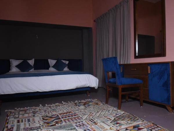 Kasbah de Tifoultoute : photo 6 de la chambre chambre deluxe (2 adultes + 1 enfant)