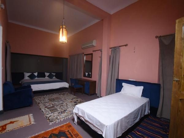 Kasbah de Tifoultoute : photo 8 de la chambre chambre deluxe (2 adultes + 1 enfant)