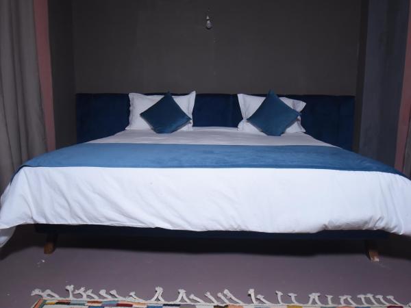 Kasbah de Tifoultoute : photo 10 de la chambre chambre deluxe (2 adultes + 1 enfant)