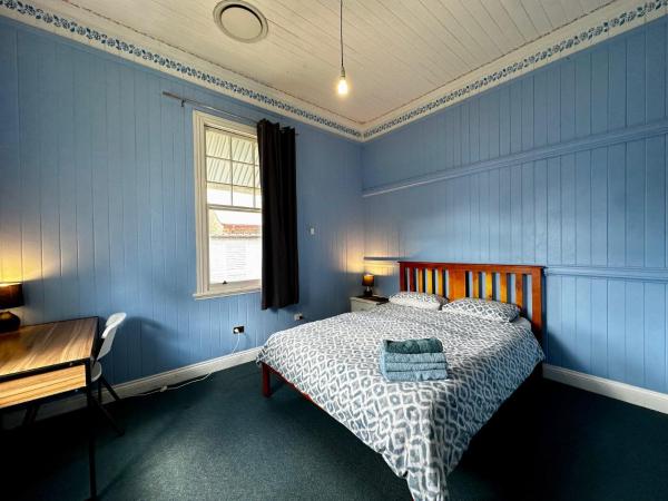 Minto Accommodation Brisbane : photo 2 de la chambre chambre lit queen-size