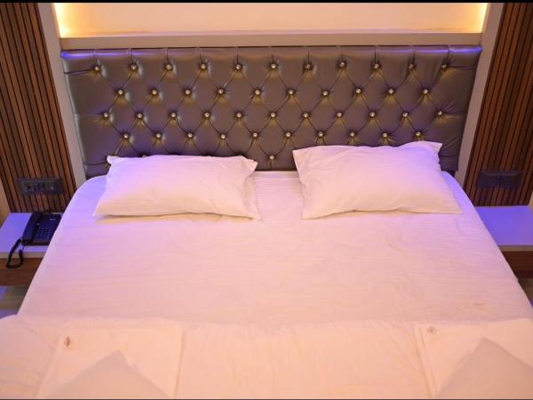 Hotel Kapila Inn Ranjangaon : photo 4 de la chambre chambre deluxe