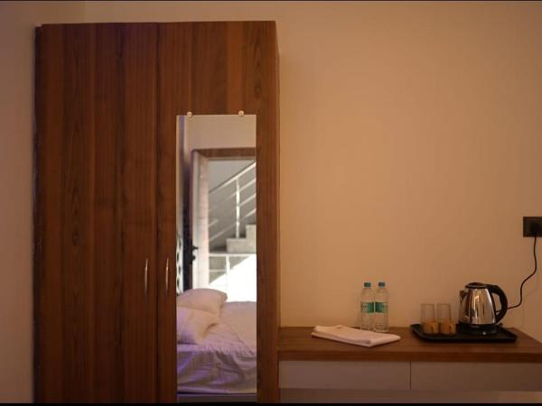 Hotel Kapila Inn Ranjangaon : photo 7 de la chambre chambre deluxe