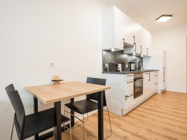 myQuartier Central City Suites : photo 3 de la chambre superior apartment s