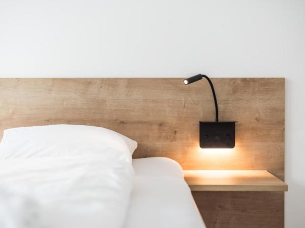 myQuartier Central City Suites : photo 3 de la chambre superior studio m