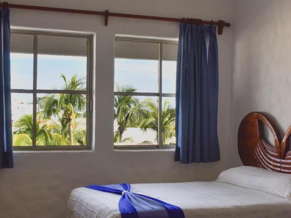 Hotel Quijote Inn : photo 7 de la chambre chambre double avec 2 lits doubles