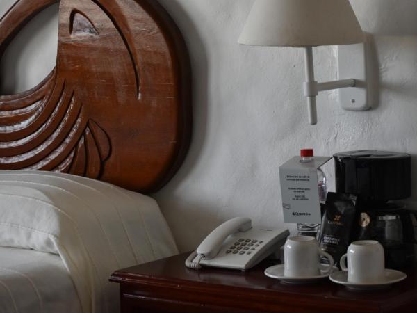 Hotel Quijote Inn : photo 9 de la chambre chambre double avec 2 lits doubles