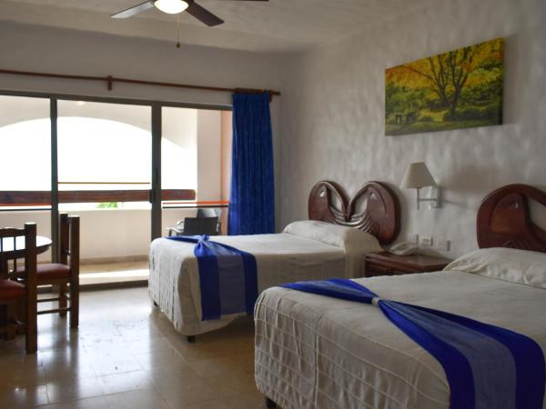 Hotel Quijote Inn : photo 10 de la chambre suite avec kitchenette