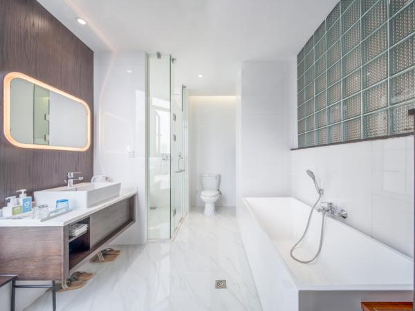 Wuyu Hotel - Chongqing Jiangbei Airport : photo 3 de la chambre chambre double deluxe avec baignoire