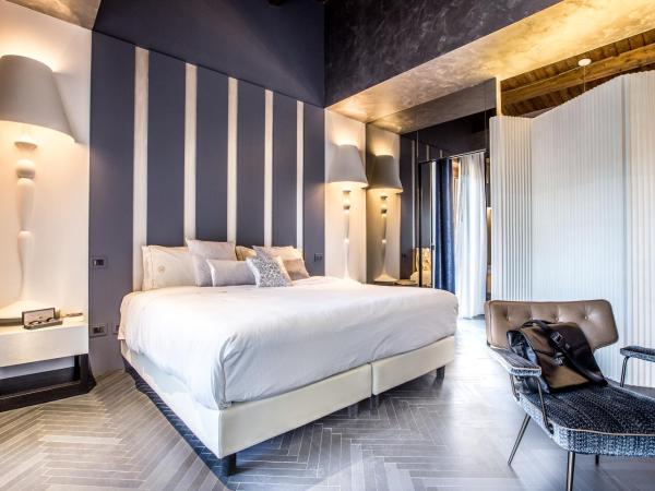 Minareto : photo 4 de la chambre suite junior avec piscine privée - vue sur jardin