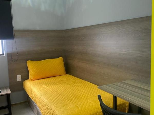 CHECK INN HOSTAL AEROPUERTO GDL : photo 5 de la chambre chambre simple avec salle de bains commune