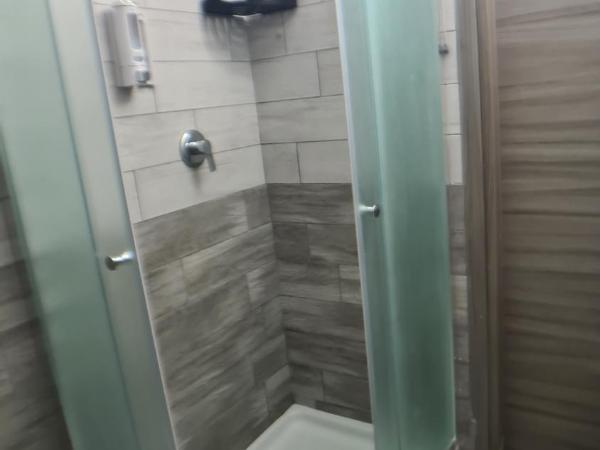 Hotel Ginevra : photo 3 de la chambre chambre triple avec salle de bains commune