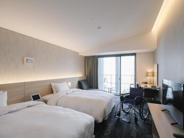 Hotel Royal Classic Osaka : photo 1 de la chambre chambre lits jumeaux pour personnes à mobilité réduite