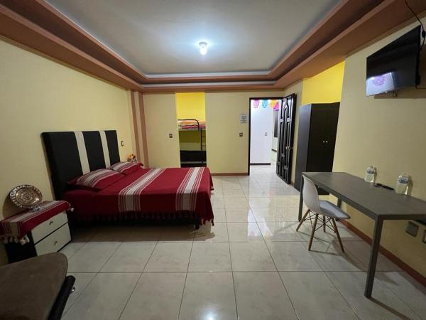 Alojamientos OHANA : photo 7 de la chambre bungalow familial