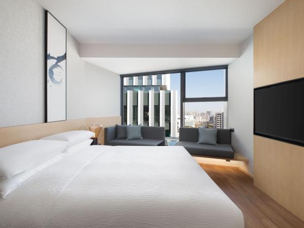 Fairfield by Marriott Shanghai Lingang Special Area : photo 4 de la chambre chambre lit king-size deluxe - vue sur ville