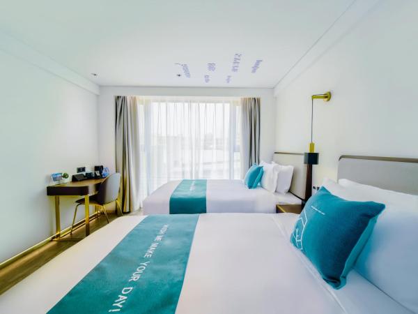 Pengke Boutique Hotel - Sungang Sunway Station : photo 2 de la chambre chambre deluxe double ou lits jumeaux