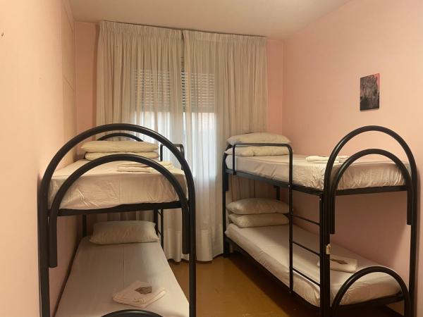 paolohome : photo 4 de la chambre chambre quadruple Économique avec salle de bains commune