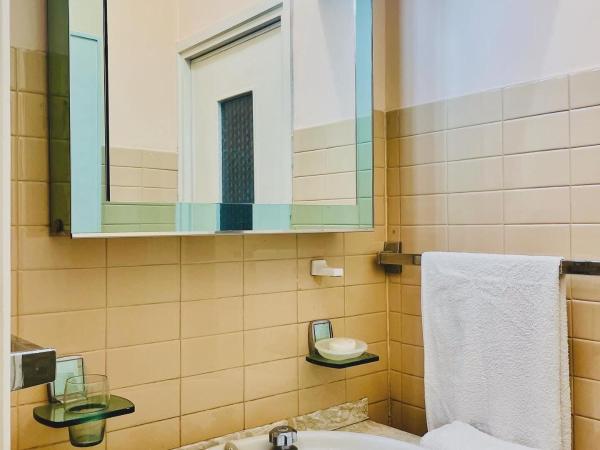 paolohome : photo 5 de la chambre chambre quadruple Économique avec salle de bains commune