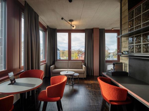 Tailormade Hotel LEO St Gallen : photo 1 de la chambre chambre lit king-size deluxe