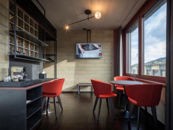 Tailormade Hotel LEO St Gallen : photo 2 de la chambre chambre lit king-size deluxe