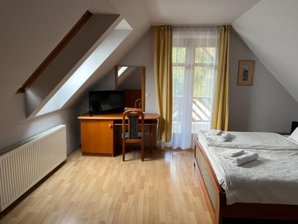 Aranykert Vendégház : photo 4 de la chambre chambre familiale