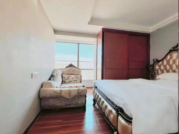 广州沃家国际公寓 : photo 4 de la chambre chambre triple - vue sur ville