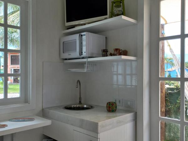 Suite Externa com Copa, WiFi e Acesso Independente : photo 1 de la chambre suite avec terrasse