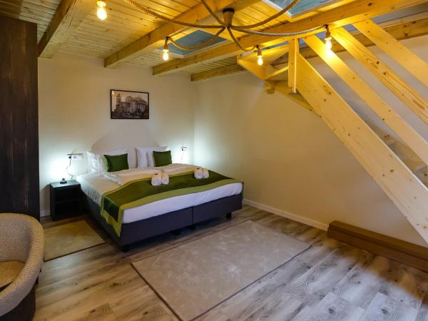 Lumen Gasztropanzió : photo 2 de la chambre appartement