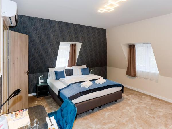 Lumen Gasztropanzió : photo 2 de la chambre chambre standard lit queen-size