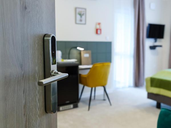 Lumen Gasztropanzió : photo 3 de la chambre chambre double deluxe avec balcon