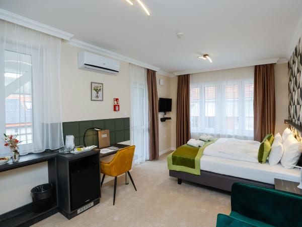 Lumen Gasztropanzió : photo 1 de la chambre chambre double deluxe avec balcon