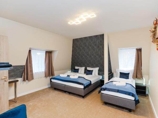 Lumen Gasztropanzió : photo 2 de la chambre chambre triple deluxe