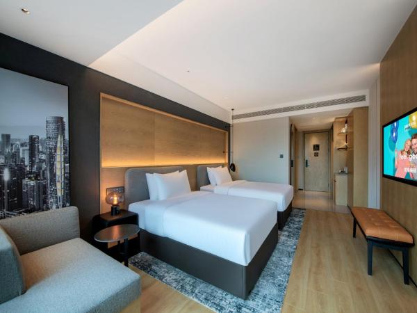 Park Inn by Radisson Chengdu Sihe Metro Station Xinchuan : photo 2 de la chambre chambre lits jumeaux confort