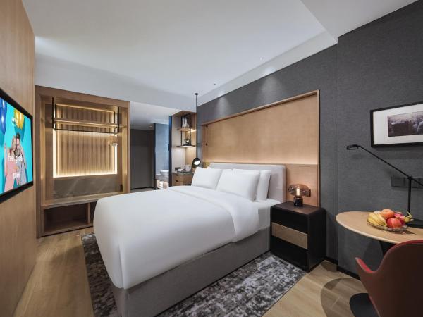 Park Inn by Radisson Tianjin Five Old Street Nanjing Road : photo 1 de la chambre premium suite with king bed