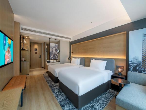 Park Inn by Radisson Chengdu Sihe Metro Station Xinchuan : photo 1 de la chambre chambre lits jumeaux avec vue