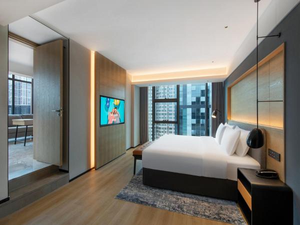 Park Inn by Radisson Chengdu Sihe Metro Station Xinchuan : photo 3 de la chambre suite avec vue