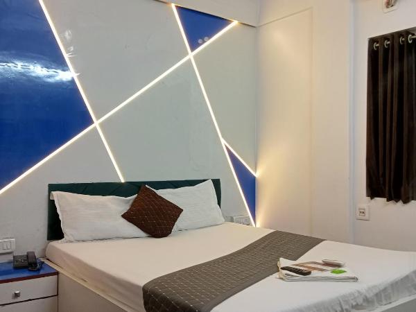 Hotel Green Leaf : photo 1 de la chambre chambre double deluxe (2 adultes + 1 enfant)