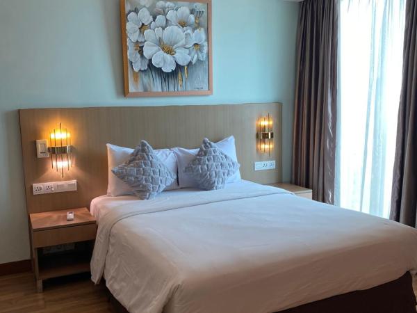 The H Tower Residence by YLS Stay : photo 1 de la chambre chambre double ou lits jumeaux supérieure avec vue sur ville