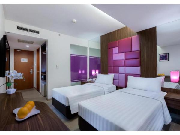 Quest Hotel Darmo - Surabaya by ASTON : photo 3 de la chambre chambre deluxe double ou lits jumeaux