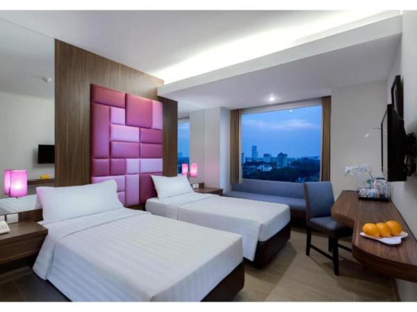 Quest Hotel Darmo - Surabaya by ASTON : photo 4 de la chambre chambre deluxe double ou lits jumeaux