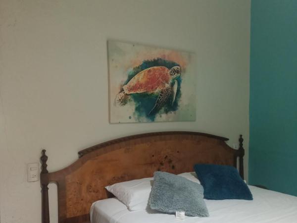 Mar de Fondo : photo 2 de la chambre chambre double ou lits jumeaux avec salle de bains