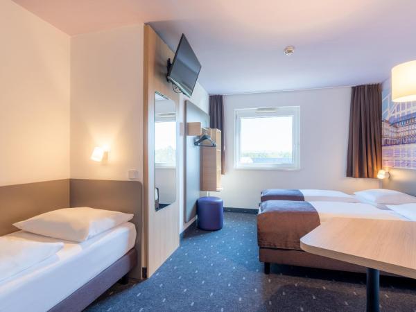 B&B Hotel Mannheim : photo 1 de la chambre chambre triple