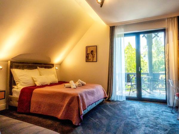 Villa Viktória : photo 9 de la chambre chambre double deluxe avec balcon