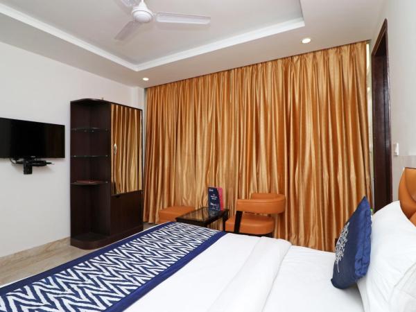 Super Collection O 980 Hotel Ramhan : photo 3 de la chambre chambre triple classique