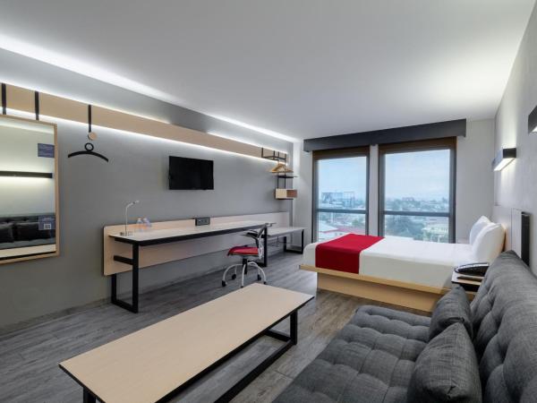 City Express by Marriott Guadalajara Aeropuerto : photo 4 de la chambre chambre lit queen-size supérieure avec canapé-lit