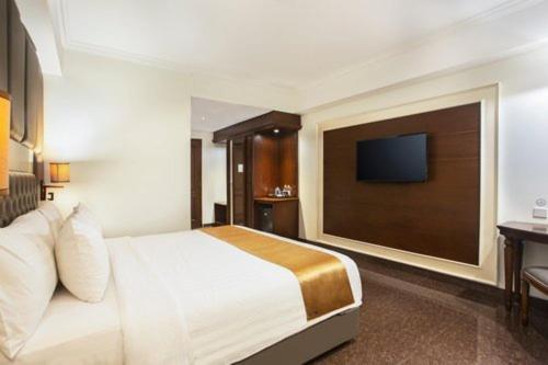 Grand Rohan Jogja : photo 1 de la chambre chambre lit queen-size deluxe