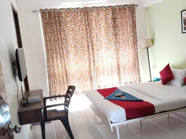 GM Hospitality Services pune : photo 1 de la chambre chambre double avec salle de bains privative